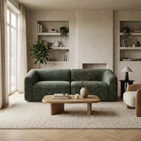 Canapé 3 places vert en tissu chenille, vue trois-quarts, finitions et coutures nettes