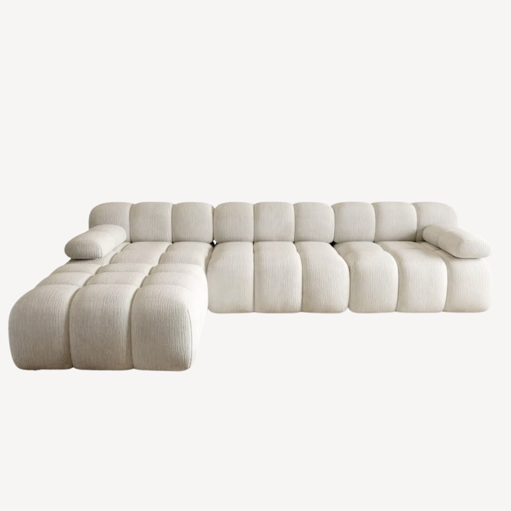 Canapé d’angle en chenille clair, modules avec méridienne, vue de face