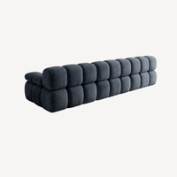Canapé d’angle en chenille bleu foncé, assise modulaire, vue latérale