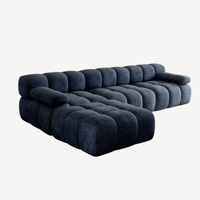 Canapé d’angle en chenille bleu foncé, méridienne déployée, vue de dessus