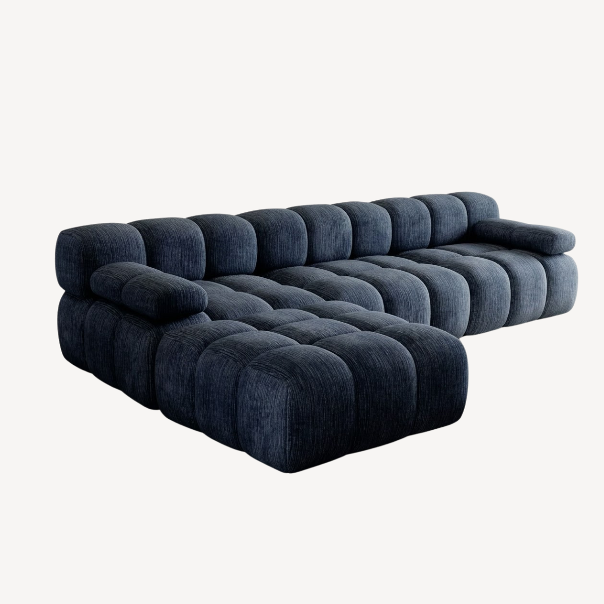 Canapé d’angle en chenille bleu foncé, méridienne déployée, vue de dessus