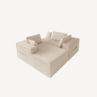 Canapé d’angle modulable 4 places en velours côtelé blanc crème, assise avec coussins.