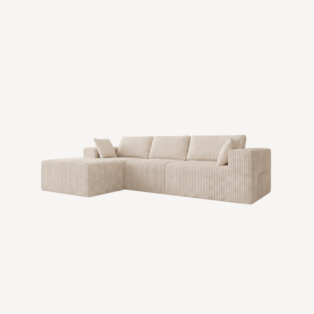 Canapé d’angle modulable en velours côtelé blanc crème, assise longue, vue de côté.