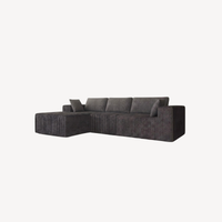 Canapé d’angle modulable 4 places en velours côtelé gris charbon, assise longue.