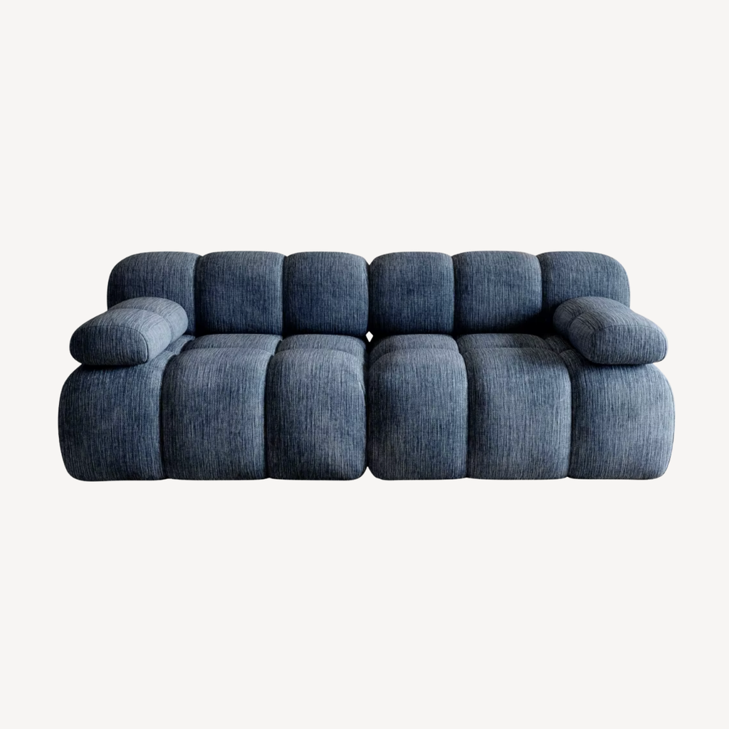 Canapé droit 2 places en chenille bleu, assise segmentée, dossier capitonné.