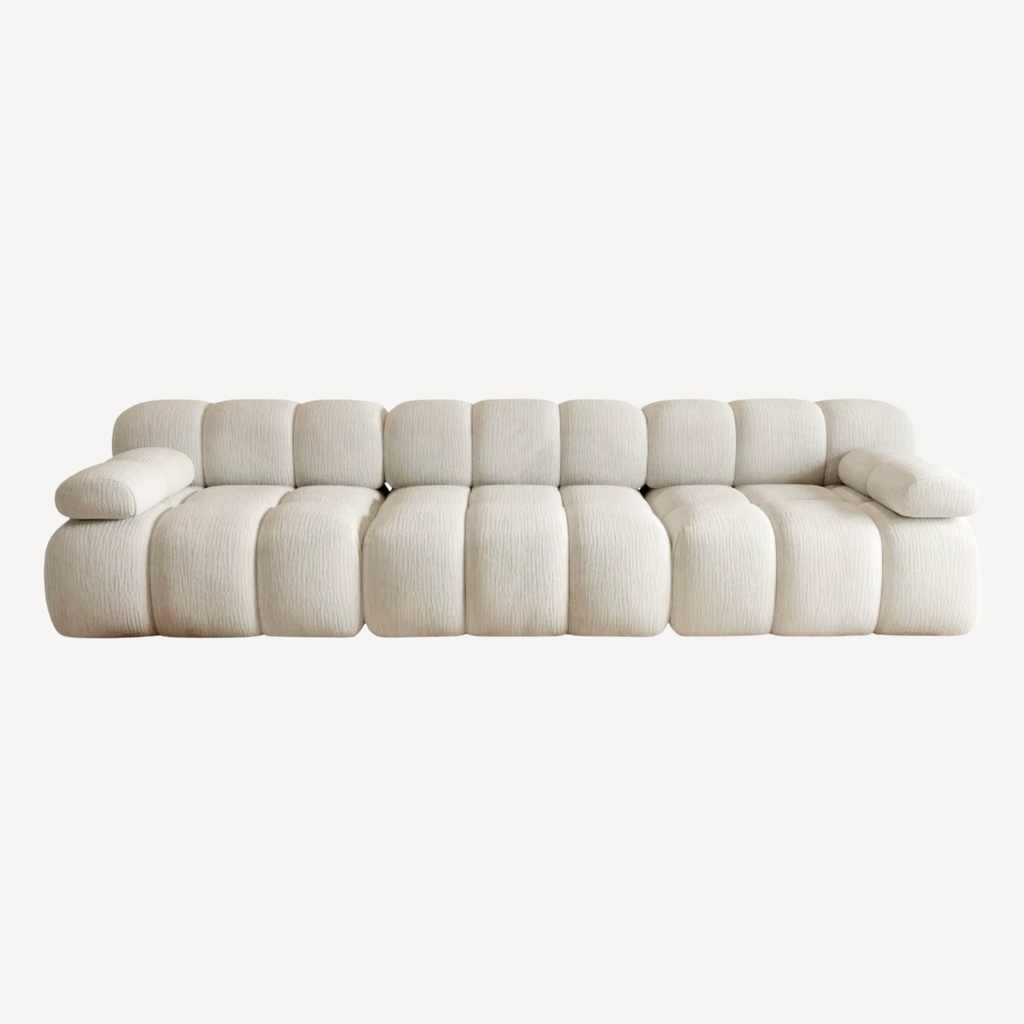 Canapé droit 3 places en chenille blanc cassé, structure en carrés matelassés
