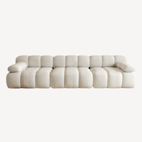 Canapé droit 3 places en chenille blanc cassé, structure en carrés matelassés