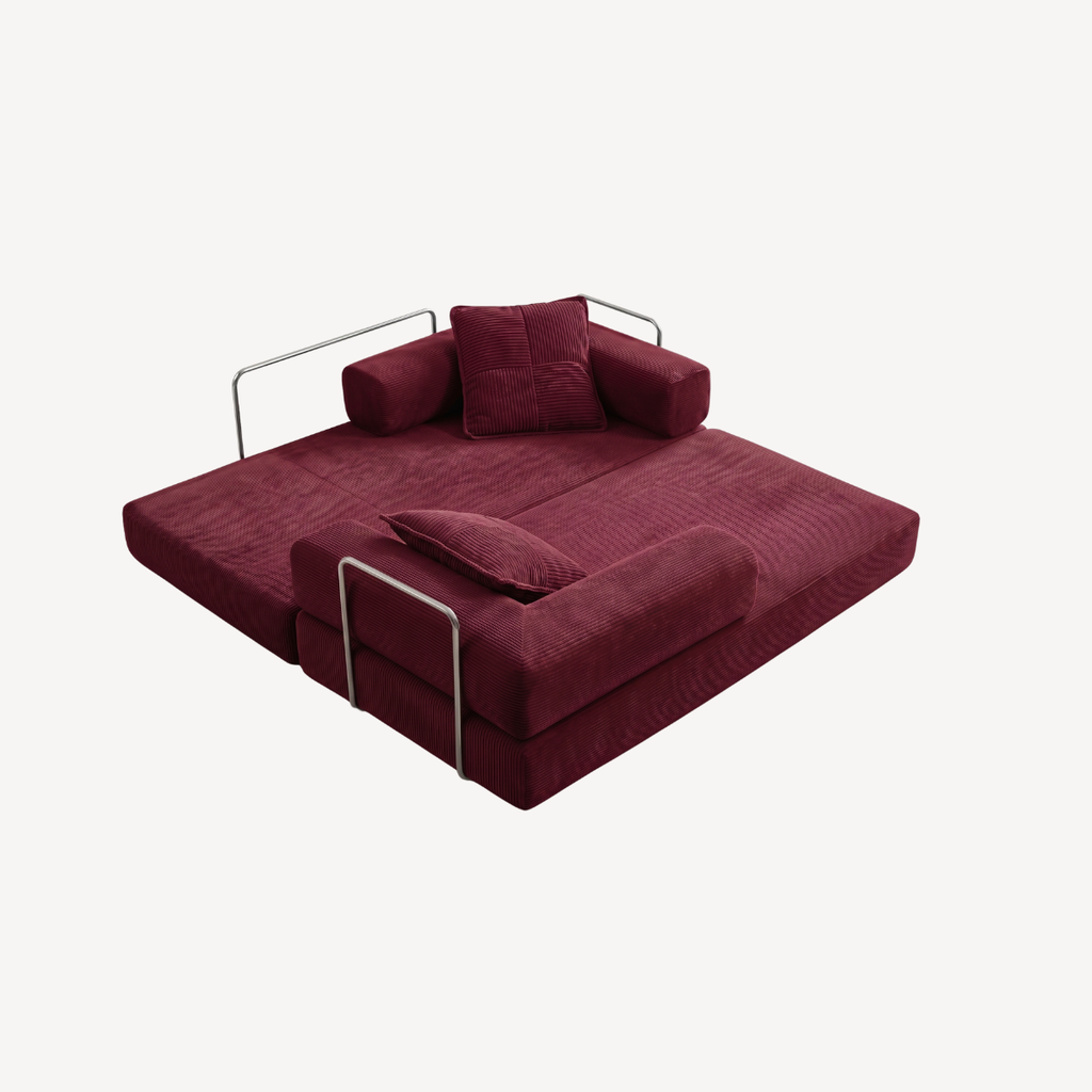 Canapé 2 places bordeaux en velours côtelé, assise dépliée avec coussins mobiles.