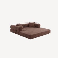 Canapé modulable velours côtelé brun en configuration méridienne, coussins au siège