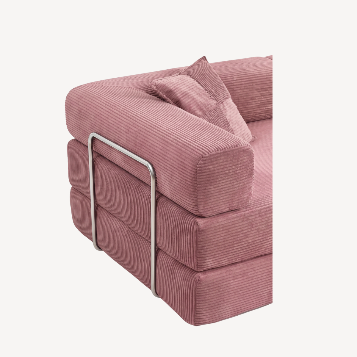 Canapé rose en velours côtelé avec barres métalliques et accoudoirs rembourrés