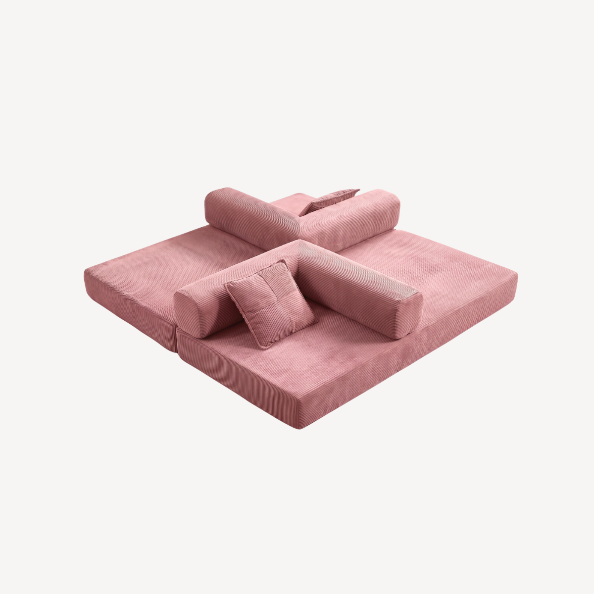 Canapé rose en velours côtelé, couchage ouvert avec coussins et accoudoirs rembourrés