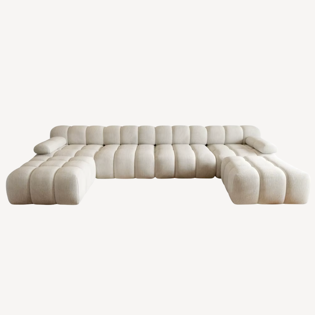 Canapé en U en chenille blanc, modules d’angle, assises profondes et coussins
