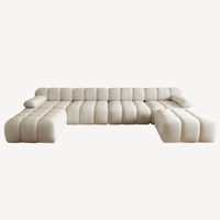 Canapé en U en chenille blanc, modules d’angle, assises profondes et coussins