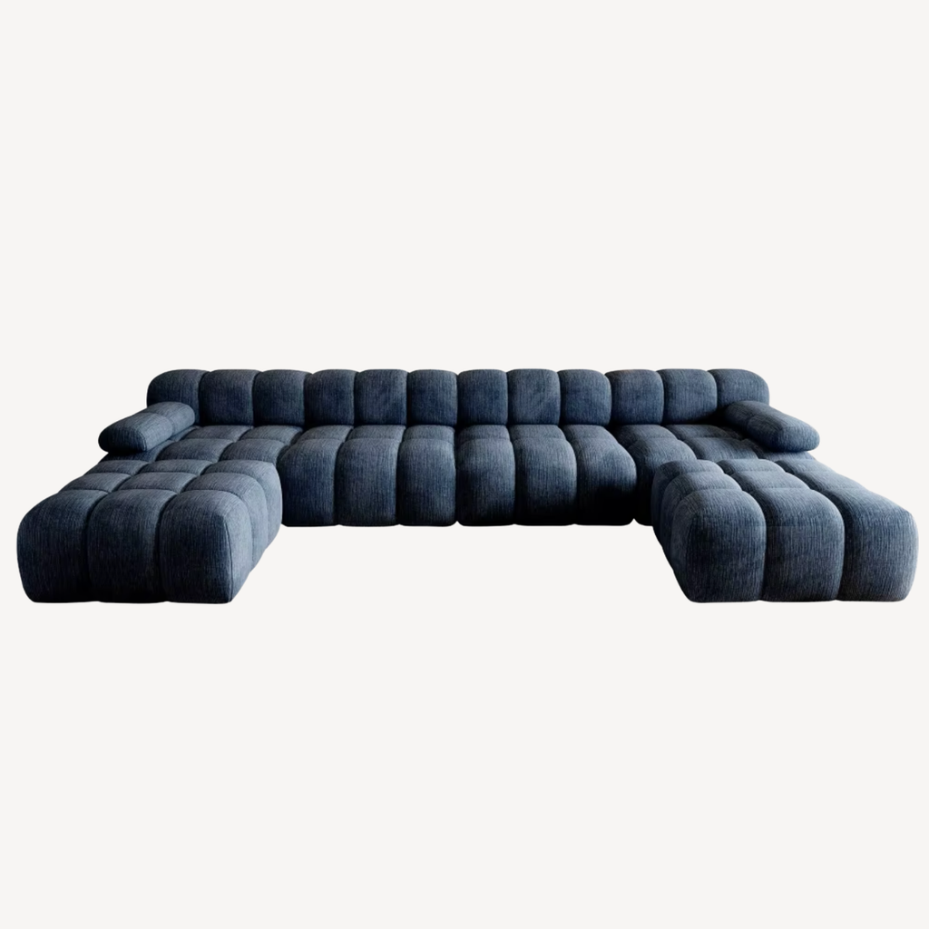 Canapé en U en chenille bleu foncé, dossier en rangées de coussins, méridienne