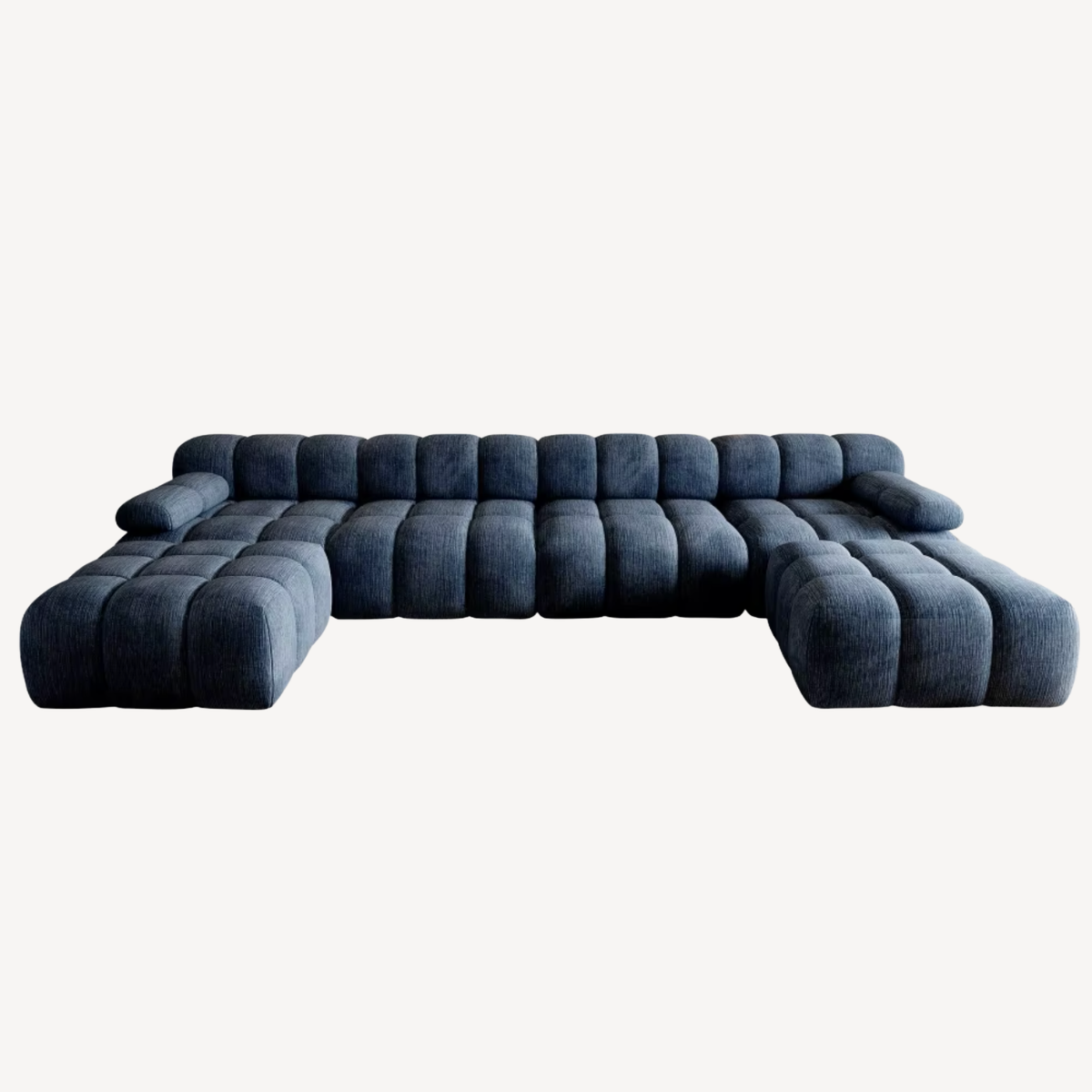 Canapé en U en chenille bleu foncé, dossier en rangées de coussins, méridienne