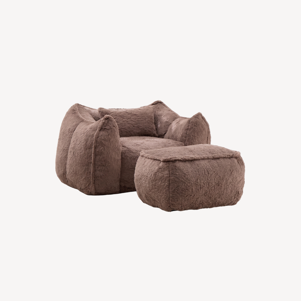 Fauteuil 1 place en fourrure marron avec repose-pied, vue latérale