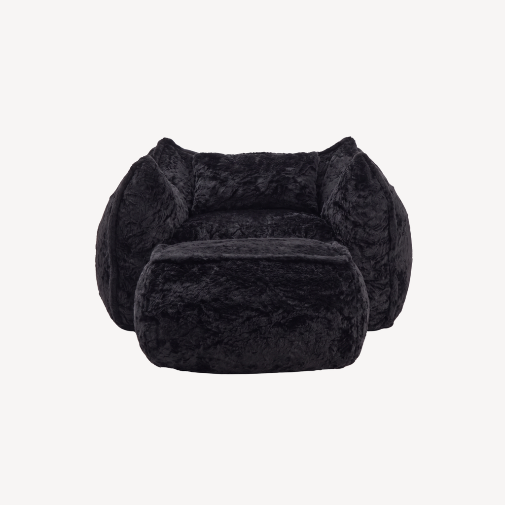 Fauteuil 1 place en fourrure noire, assise et accoudoirs rembourrés