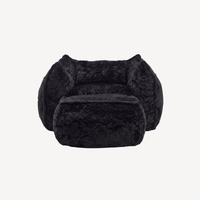 Fauteuil 1 place en fourrure noire, assise et accoudoirs rembourrés