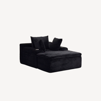Fauteuil compressé 1 place en velours côtelé noir, dossier et accoudoirs rembourrés.