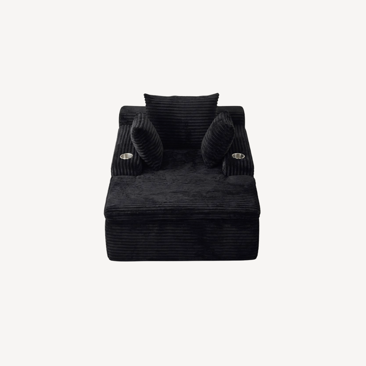 Fauteuil compressé 1 place en velours côtelé noir, face avant avec coussins roulés.