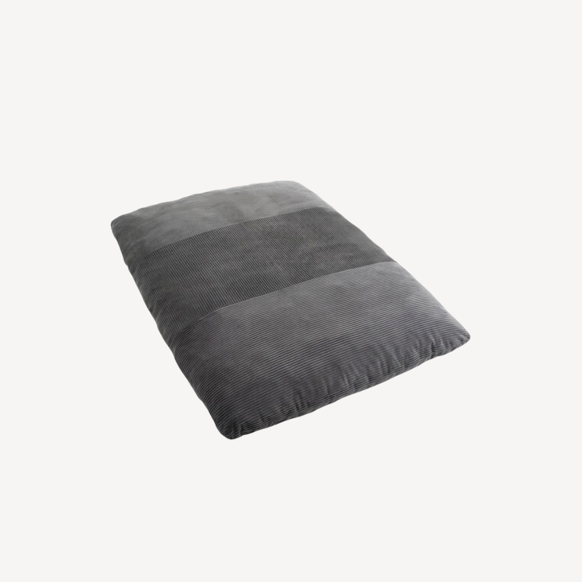 Pouf gris en velours côtelé, forme compacte avec dossier et assise rembourrés